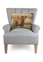 Highland Cow  Pillow needlepoint on a chair